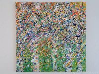 Frontal view of canvas against white wall