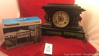 Photo showing the Panasonic radio with original box next to the Sessions mantle clock