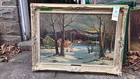 Full view of framed winter landscape painting showing scene and frame