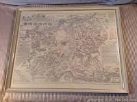 Framed entire view of the mounted black and white detailed map with visible artwork and German script text.