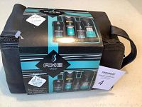 Front view of the new Axe Apollo men's gift set in black and teal travel bag, showing packaged products and branding.