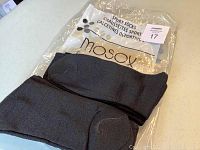 Plastic package labeled Mosox Collection and black socks, showing new condition and branding.