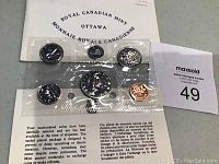 Photo showing front of sealed 1972 Canadian Mint coin set with six coins visible in original plastic packaging and Royal Canadian Mint text.