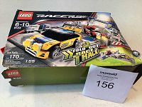 Lego Racers Ice Rally Racer set 8124 in original box showing yellow and blue car, fold-out racetrack, and set branding