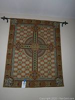 Front view of Celtic tapestry showing full detailed design and hanging rod.