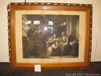 Framed print showing the full artwork of Lord Russell and children, inside a large decorative carved wooden frame with glass cover.