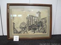 Full front view of the framed print "Templio di Ercole," showing the entire artwork and frame with visible wear and missing decorative elements.