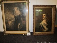 Two framed prints standing side by side. Left print is Mary Queen of Scots in an ornate frame with visible damage and water staining on the print border. Right print is The Soul's Awakening in an intact carved gold frame with some wear.