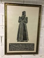 Full view of the large framed vintage rubbing art, showing the entire figure and the gold-toned ornate frame.