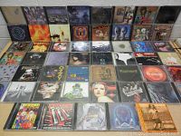 Full view of the 53 CD lot laid out in rows showing album cover art and jewel cases.