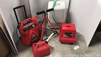 Grouped view of all five items: compressor, dehumidifier, gas can, step stool, and knee kicker