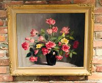 Full front view of framed painting against brick background