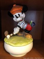 Mickey Mouse golfer figurine music box showing detailed scenic base.
