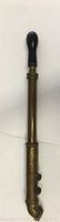 Full length view of the antique brass sprayer showing the nozzle, main body and black handle