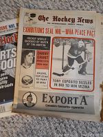 Photo of The Hockey News magazine cover with headlines about NHL-WHA peace pact, Danny Grant, Tony Esposito, and hockey updates