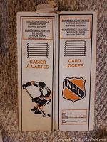Front side of the locker showing NHL logo, hockey player illustration, shelves slots, and printed division information.