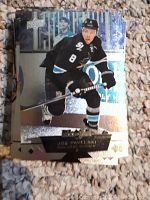 Close-up photo of a Joe Pavelski hockey card from the 2012-13 Upper Deck Black Diamond series showing holographic reflective finish and San Jose Sharks uniform.