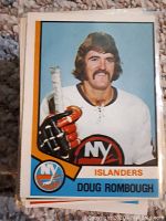 Front view of player card featuring Doug Rombough in New York Islanders jersey.