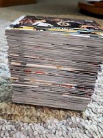 Stack of hockey cards taken from a side view showing thickness and quantity approximately 180 cards.