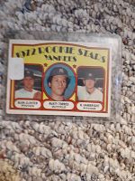 Front view of 1972 OPC baseball card showing three Yankees rookie players in individual portraits with yellow and red border design.