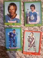 Four 1973-74 Toronto Maple Leafs hockey cards front side images showing players in uniform with green or red borders