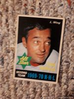 Front of the 1970-71 O-Pee-Chee Frank Mahovlich hockey card showing player's portrait and All Star Second Team designation.