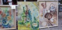 Three still life paintings group photo showing floral, glass bottles, and kitchen themed paintings, two framed and one unframed stretched canvas.