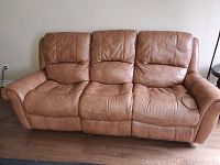 Front view of full three-seat sofa in neutral position