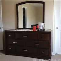 Front, full view of the Brick dresser with mirror, showing dresser drawers and mirror frame.