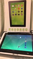 ZEKI tablet in front of its box with Google Play screen visible