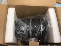 Mixed flow duct fan system model AL CLT 6 inside original shipping box with foam inserts and plastic wrap.