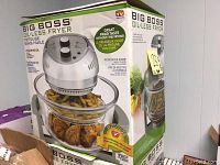 Photo of Big Boss Oil-Less Fryer box showing front view with product image and fried food examples.