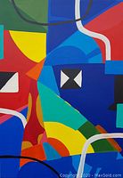 Close-up of abstract geometric shapes in red, blue, green, yellow and white curved lines