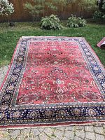 Overall front view of rug laid flat on patio