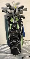 Front view of TourTrek golf bag fully loaded with clubs