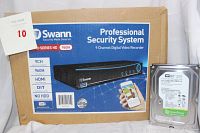 Original box of the Swann Professional Security System DVR showing 9 channel capability, 960H resolution, HDMI output, and DIY features.