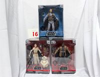Three boxed Star Wars Elite Series die cast figurines: Rey & BB-8, Bodhi Rook, and Finn.