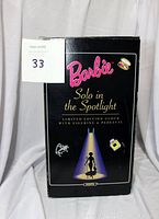 Box showing Barbie Solo in the Spotlight Limited Edition Clock with Figurine and Pedestal text and graphics