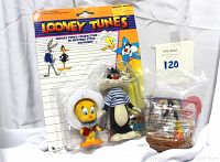 Front view of the 1989 Looney Tunes Sylvester and Tweety Western Costume toy set in original sealed Toys R Us blister packaging.