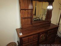 Overall view of Basset wooden dresser with detachable mirror and side shelves on mirror frame.