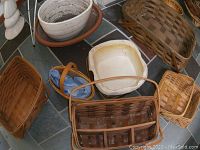 Overview of baskets and ceramic bowls, various sizes and shapes