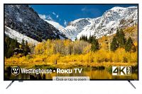 Front view of 58" TV powered on displaying scenic image with visible Westinghouse and 4K HDR branding and attached legs