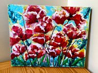 Front view of encaustic painting showing red poppies on wood panel