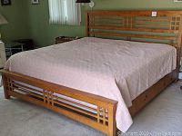 Full left-front view showing overall bed frame and headboard design