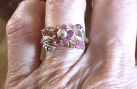 Ring worn on finger showing scale and fit