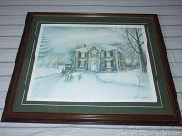 Framed print "Time for Sharing" showing a large house in a snowy winter scene with two figures and details of the frame and matting.