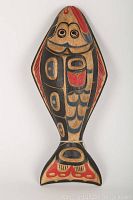 Full front view of the carved fish rattle