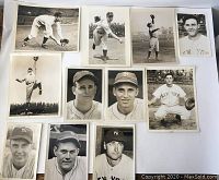 Overview of all eleven original black and white press photos laid out showing various Yankees players in on-field and portrait poses
