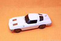 Top side view of white 1963 Corvette Stingray porcelain decanter showing hood vents and front windshield details