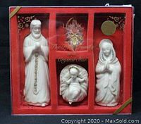 Front view of original boxed Lenox Jewels Collection Holy Family set with Joseph, Mary, Baby Jesus figurines and Crystal Star ornament.